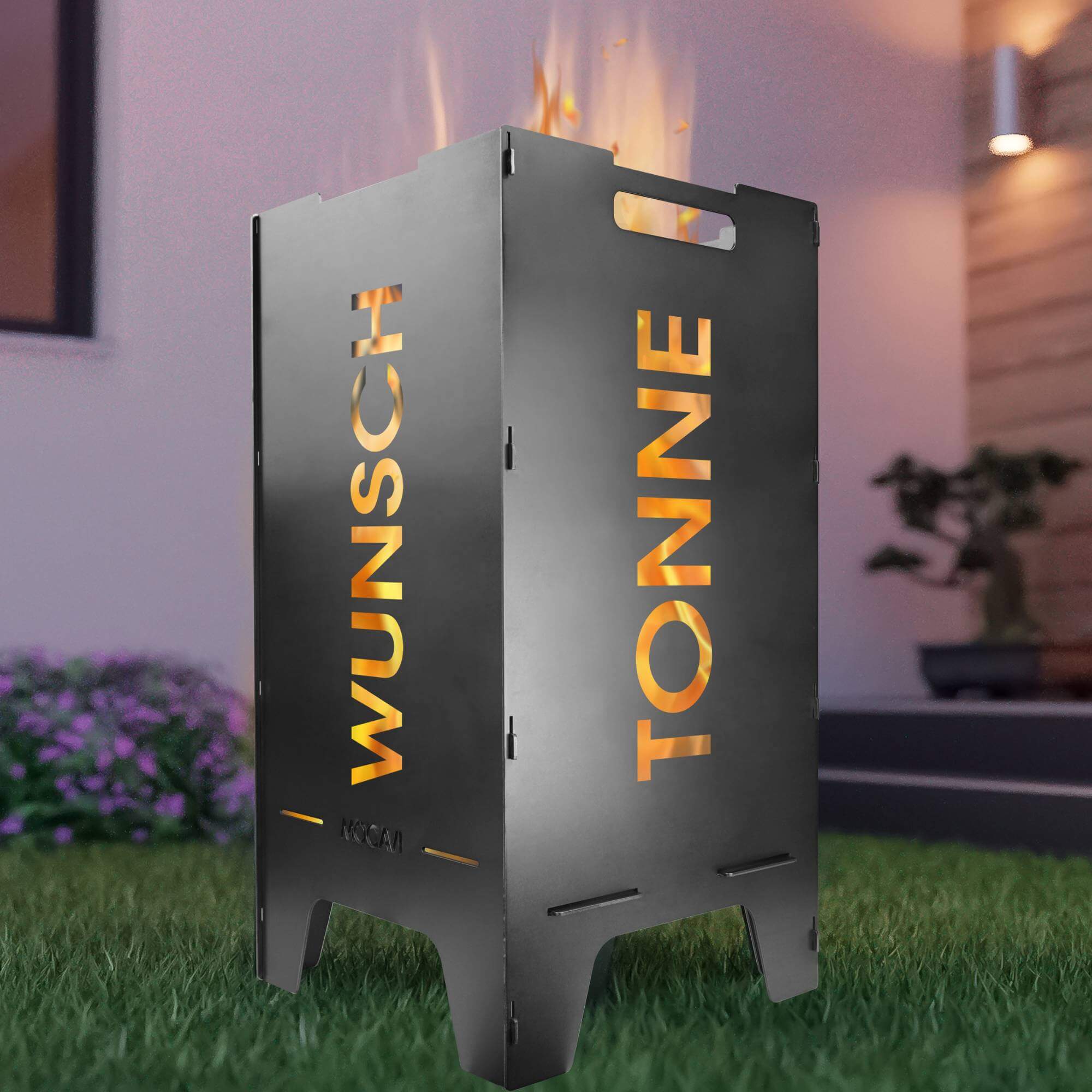 Eine Feuertonne steht im Garten, individuell gestaltbar mit frei wählbaren Motiven.