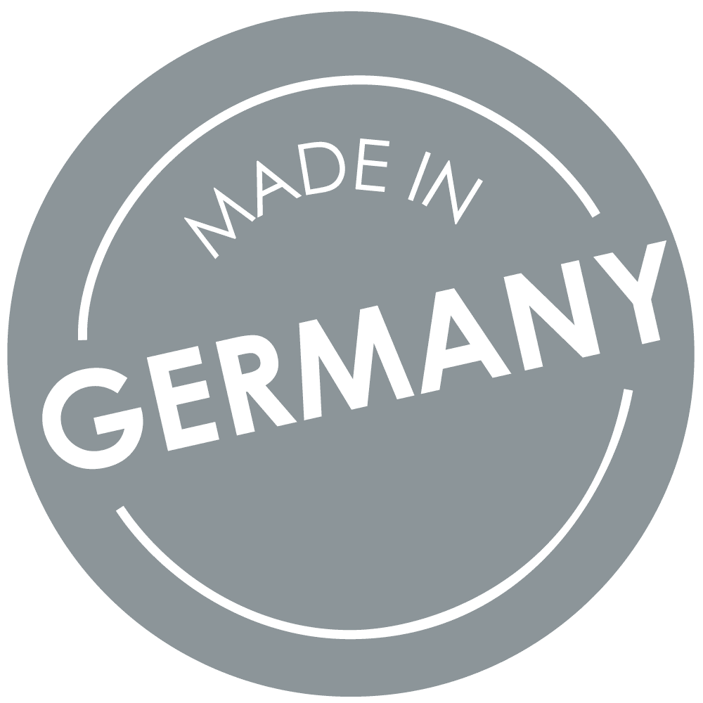 Modernes rundes Icon „Made in Germany“ in weißer Schrift auf grauem Hintergrund